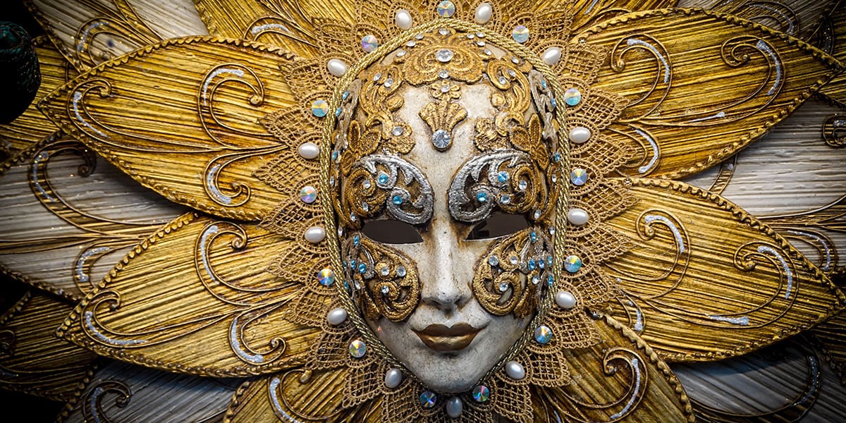 Ornate golden mask representing authority in leadership.
